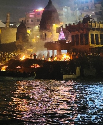 Night-time Image of pyres at Manikarnika, aka the Burning Ghat, in Varanasi, October 2024