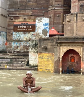 Man bathing in the ganga at Darbhanga Ghat, September 2021